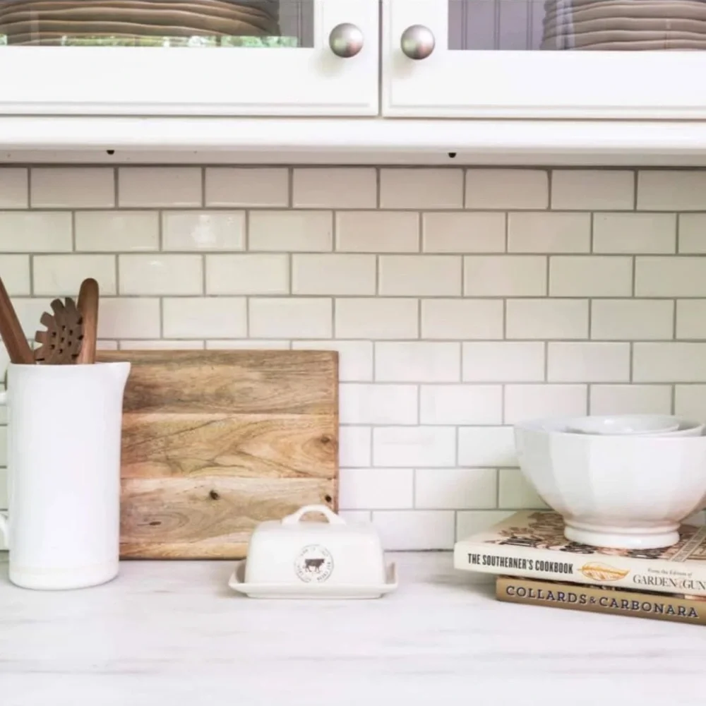 Creative Co-Op White Ceramic Butter Dish with Cow Design